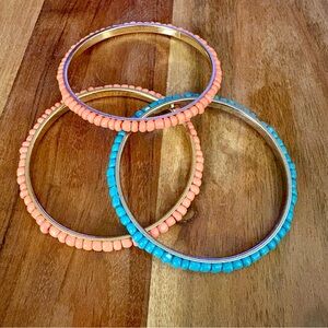 Pink and blue silver tone bangle set‎